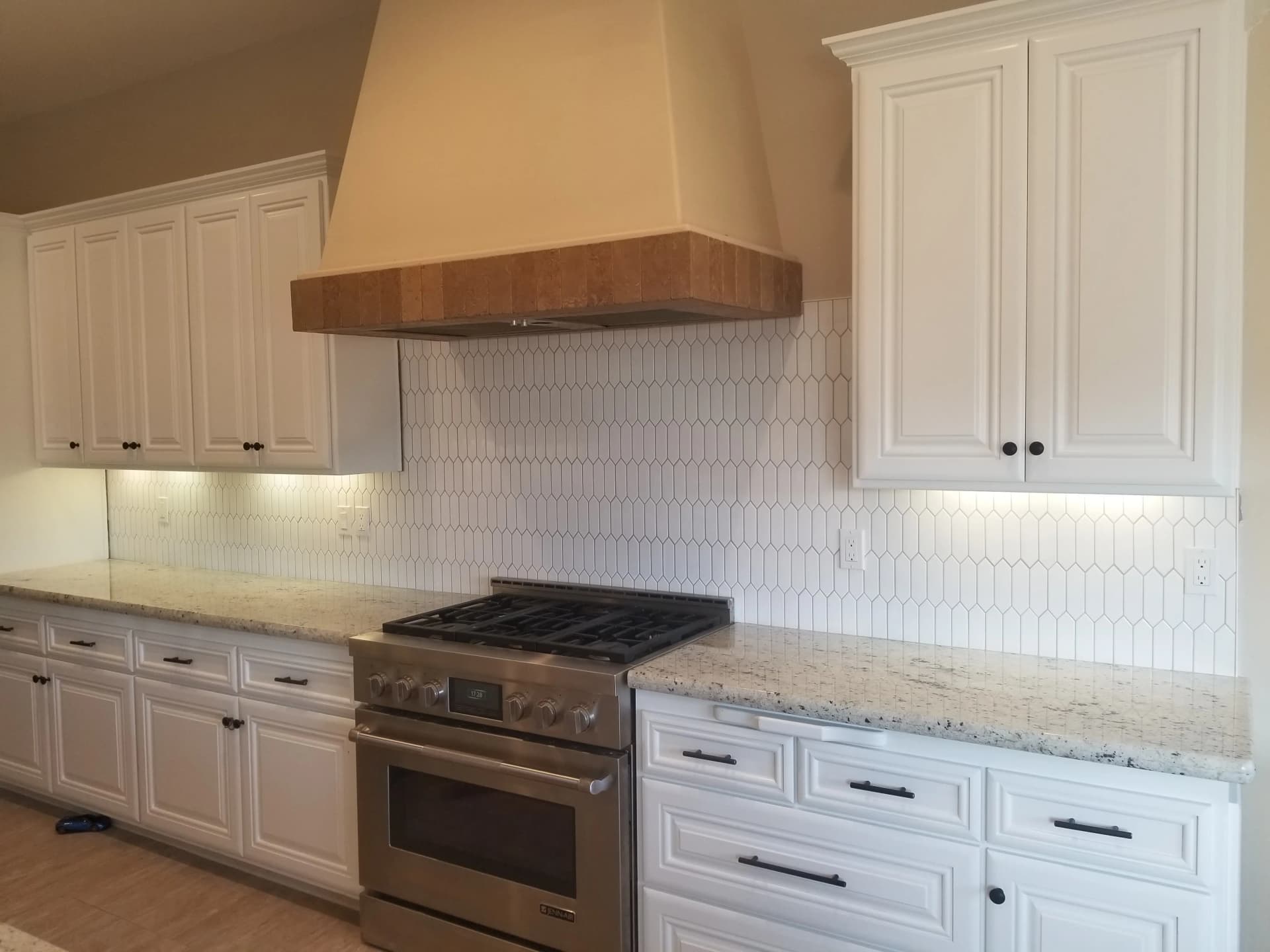 Beautiful backsplash installation by Bello Tile